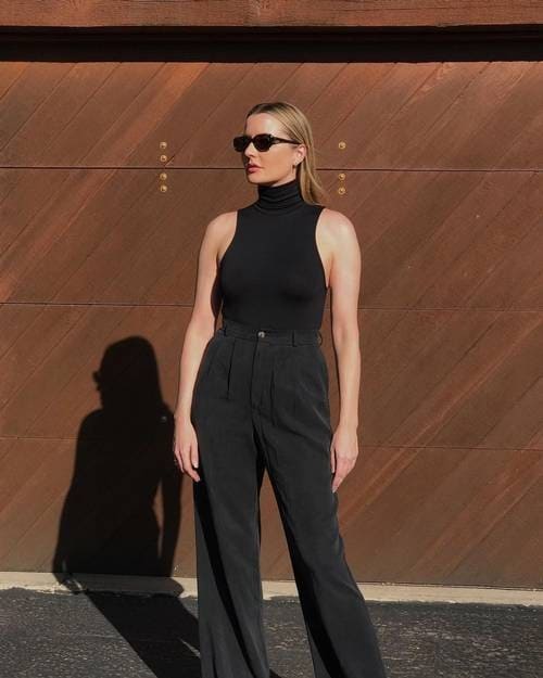 10 – Black Monochrome Sleeveless Turtleneck Top With Dress Pants