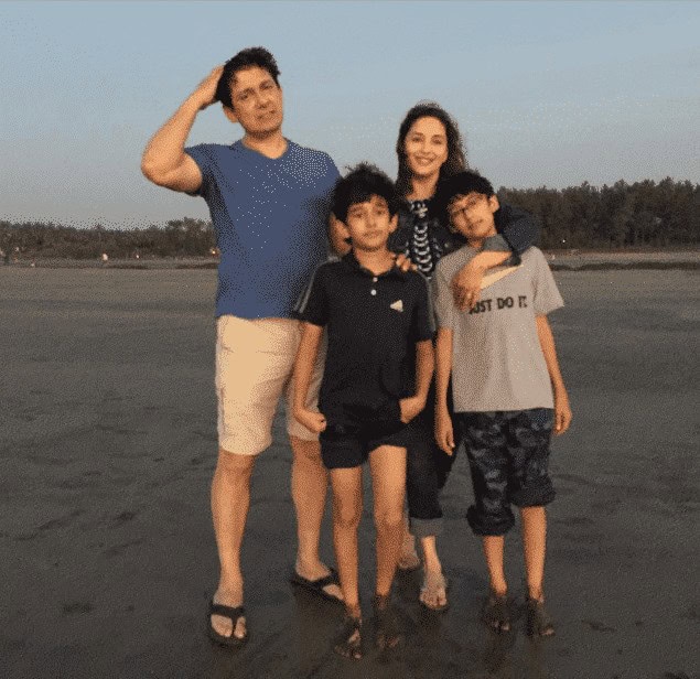 ↓ 9 – Madhuri Dixit With Her Family On Beach