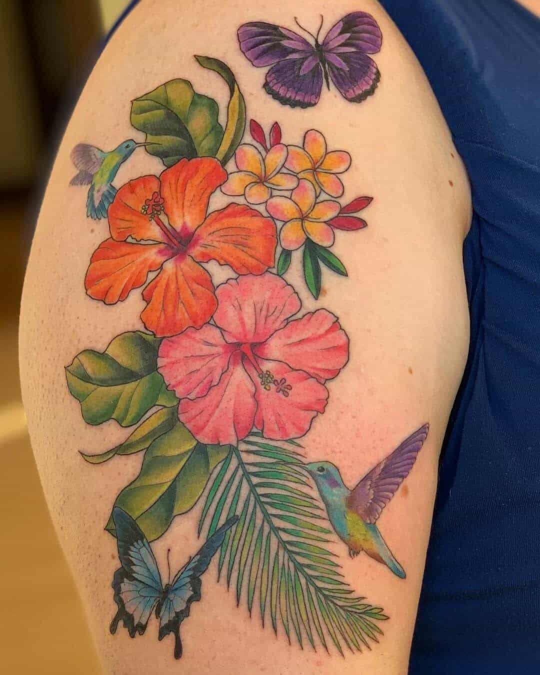 ↓ 18 – Colorful Frangipani Tattoos