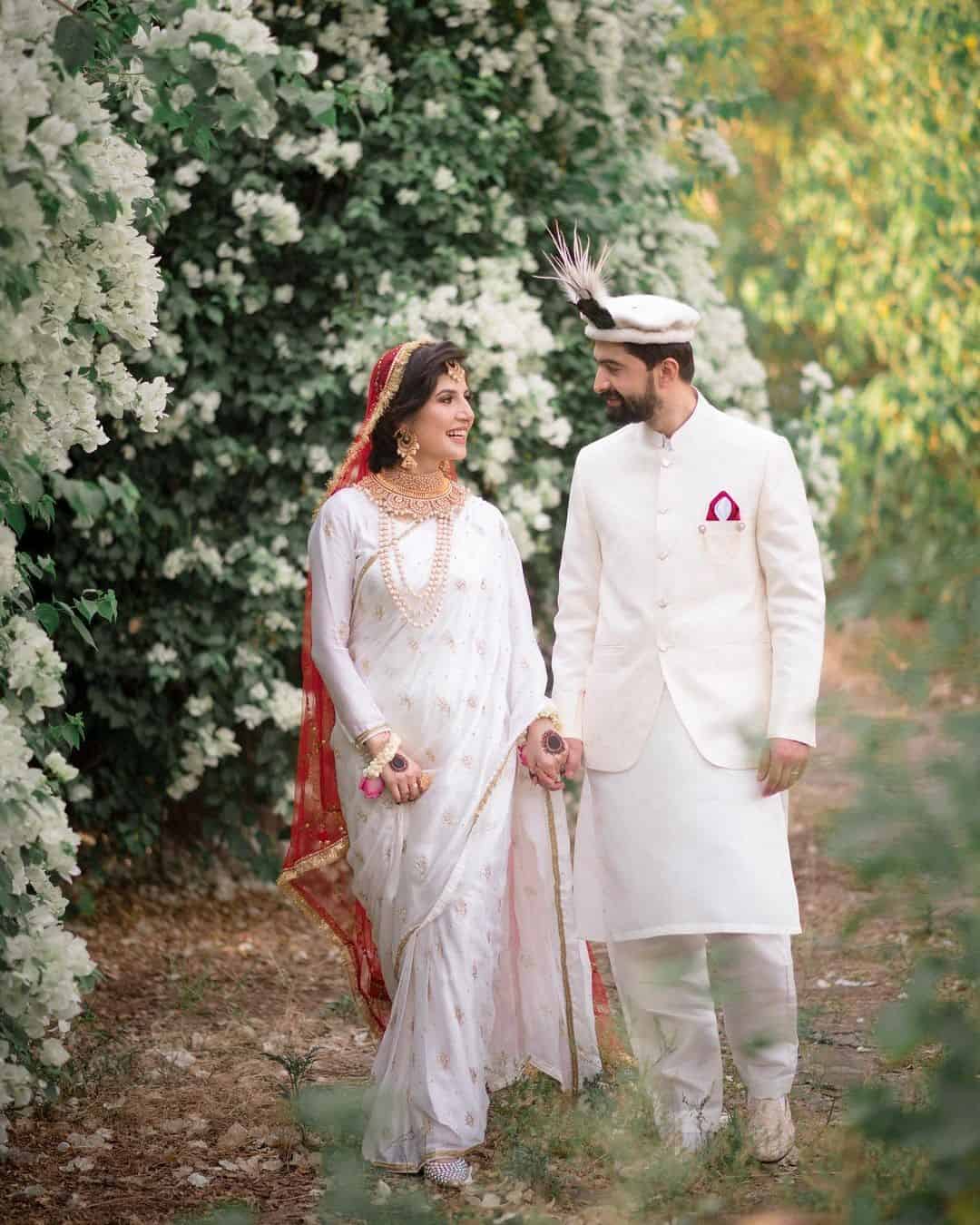 03 – Pair a White Sari with Red Dupatta to get the Perfect Poised Bridal Look!