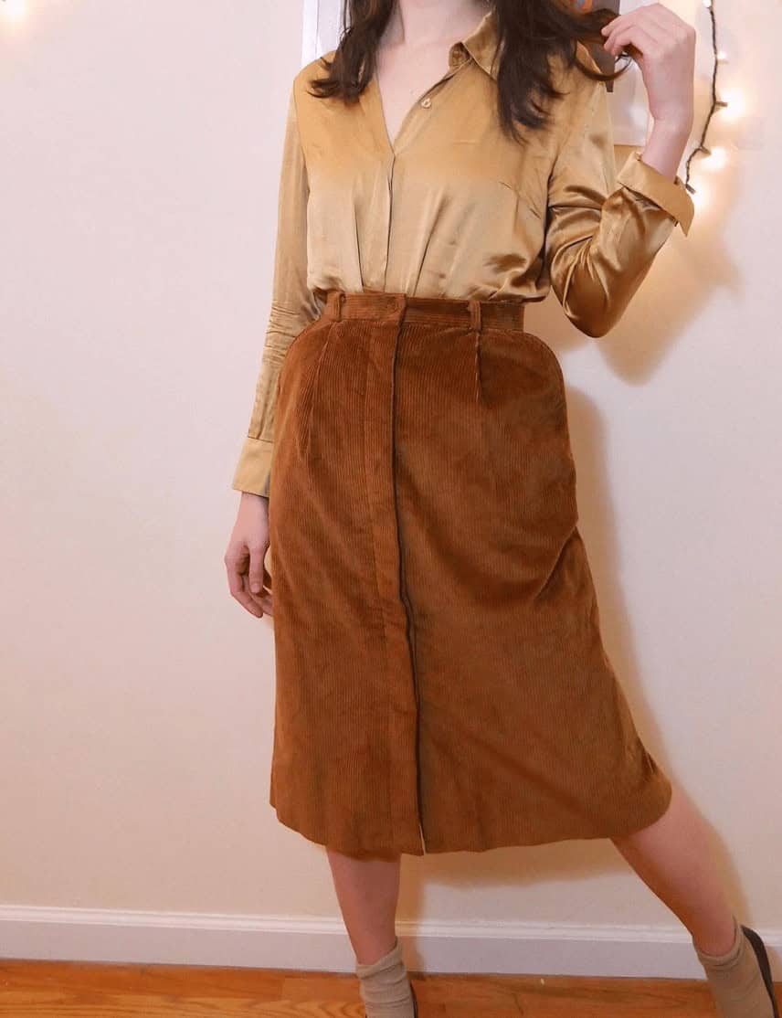 12 – Go For a Silk Top and Camel Skirt