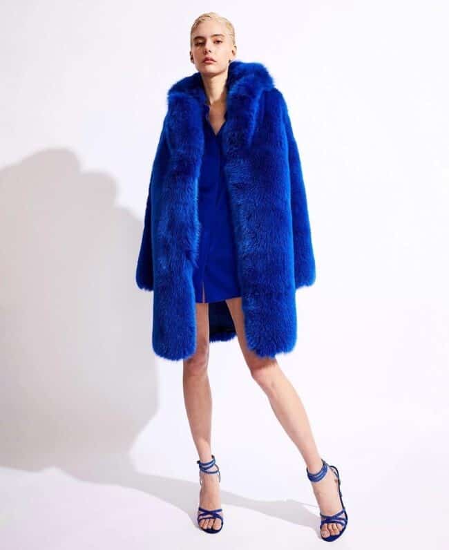 10 – Fluffy Oversized Coat Over Electric Blue Matching Dress And Heels