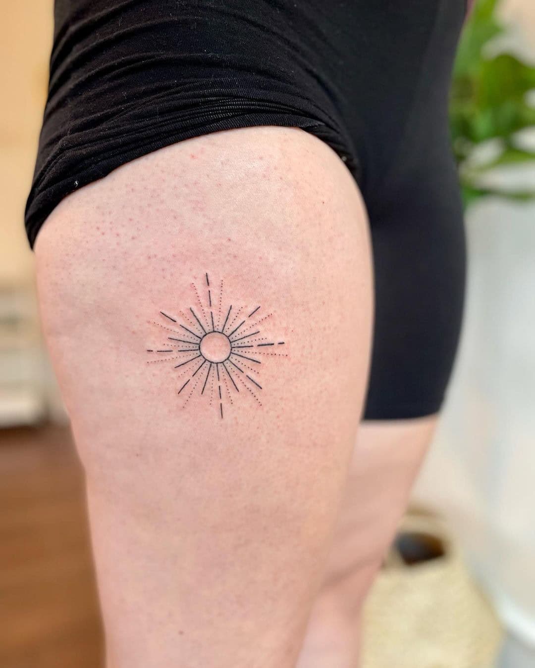 7 – Sun Tattoo