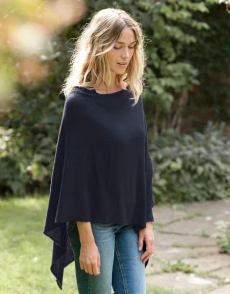 15 – Skinny Jeans With A Plain Black Poncho