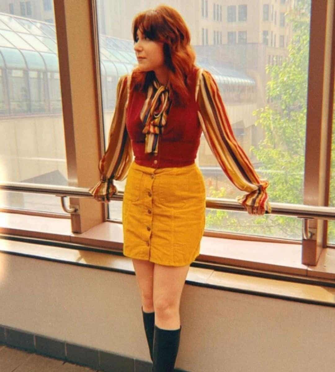 9 – Yellow Skirt With A Tucked In Blouse