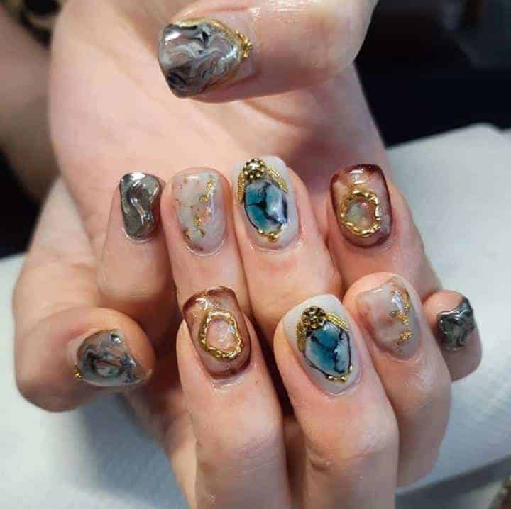 ↓ 12. Elaborate Nail Art