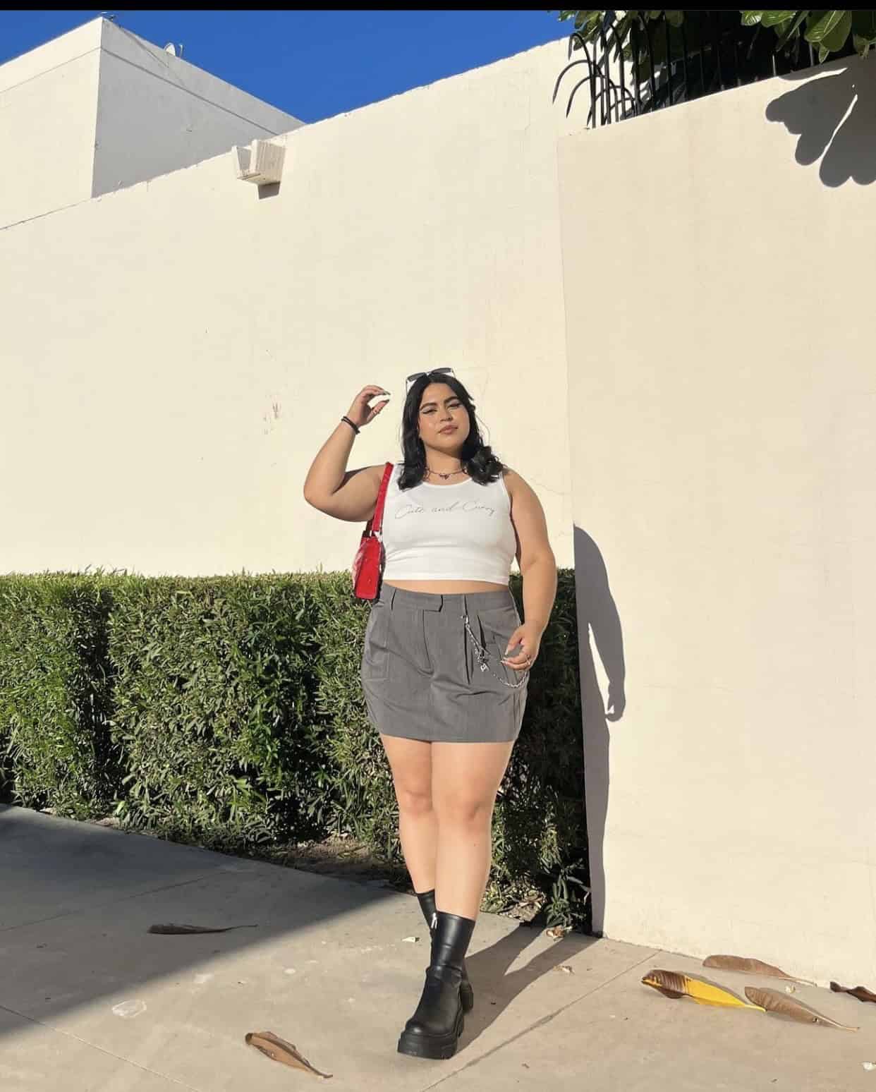 8 – blinged white tank top with cargo grey skirt paired with long boots