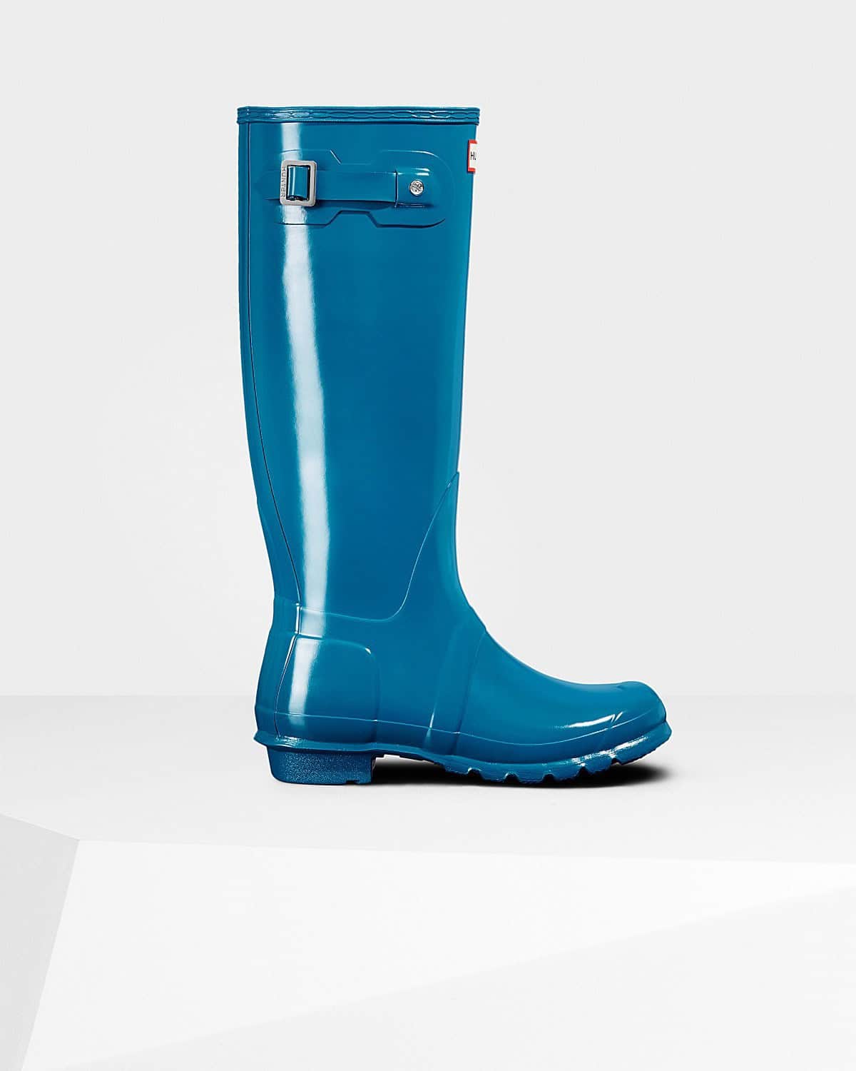 ↓ 9 – With Blue Hunter Boots for a Funky Look