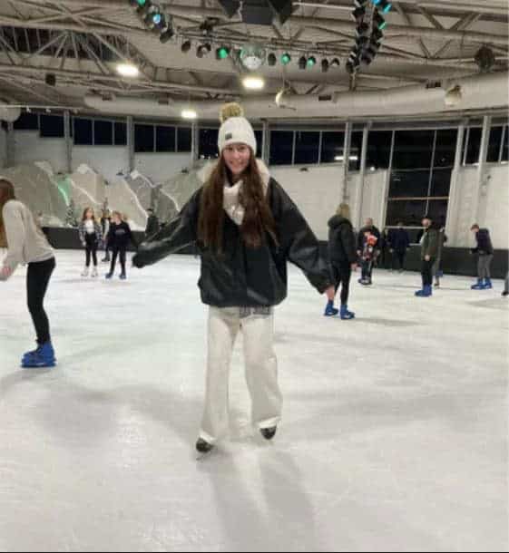 12 – Black Coat And White Jogging Pants Monochrome Ice Skating Outfit