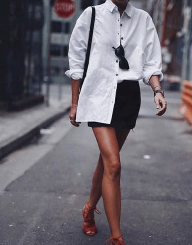 ↓ #2. Wear it oversized and tucked into a mini skirt