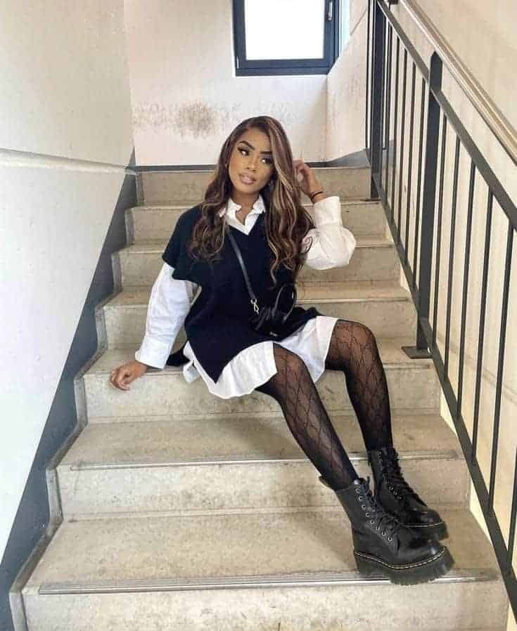 10 – White Collar Shirt And Black Sleeveless Sweater With Fishnet Stockings