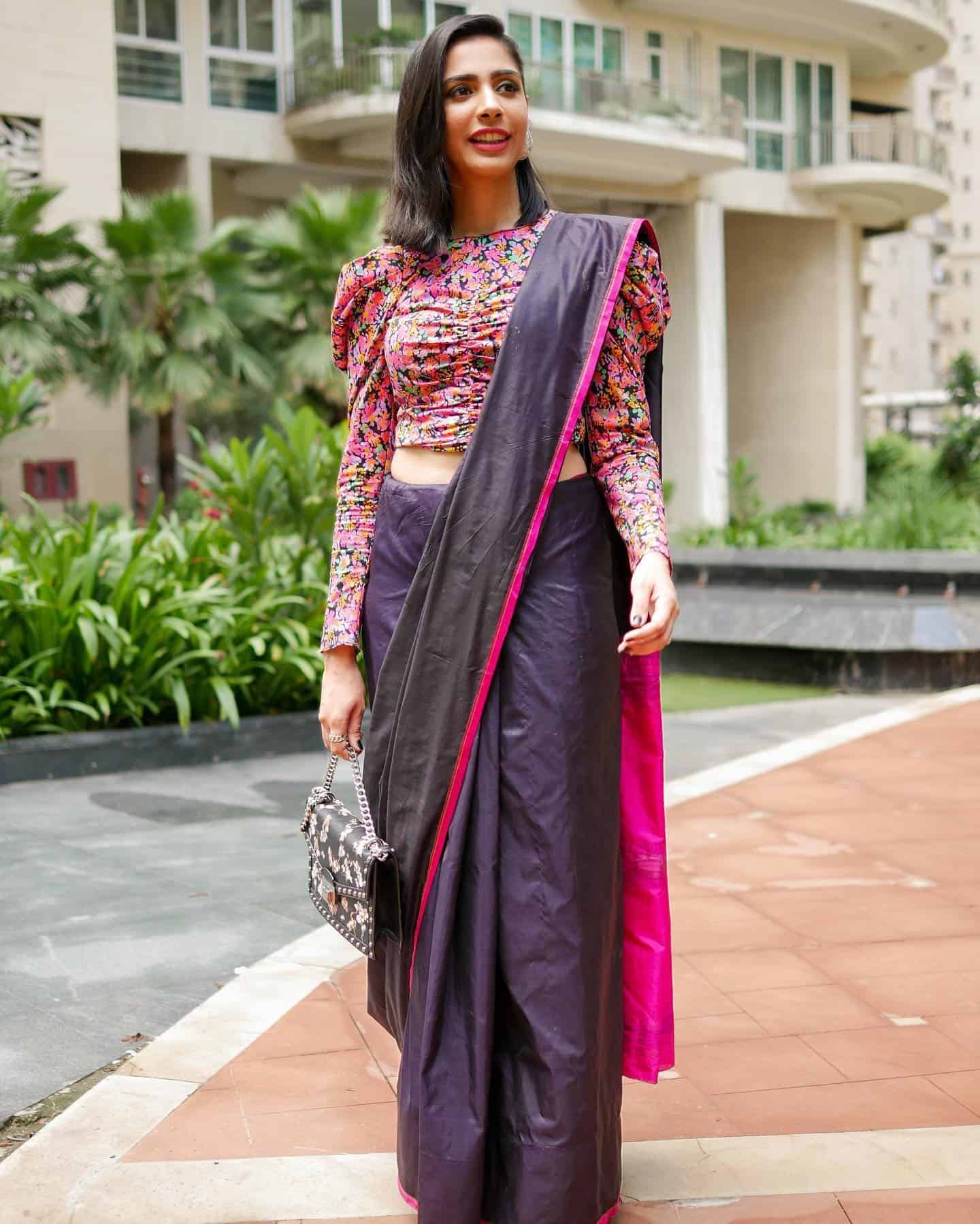 Plain Black Saree With a Floral Blouse