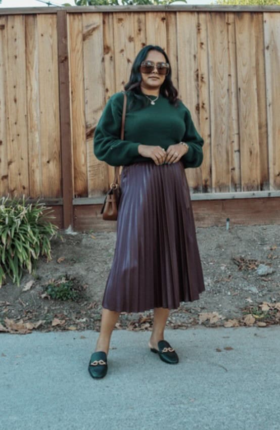 6 – An emerald knitted sweater paired with a maroon flared skirt