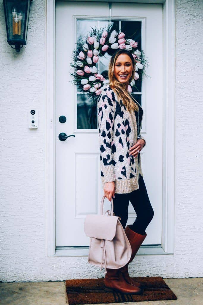 66 – Boots With Black Leggings And Printed Sweater