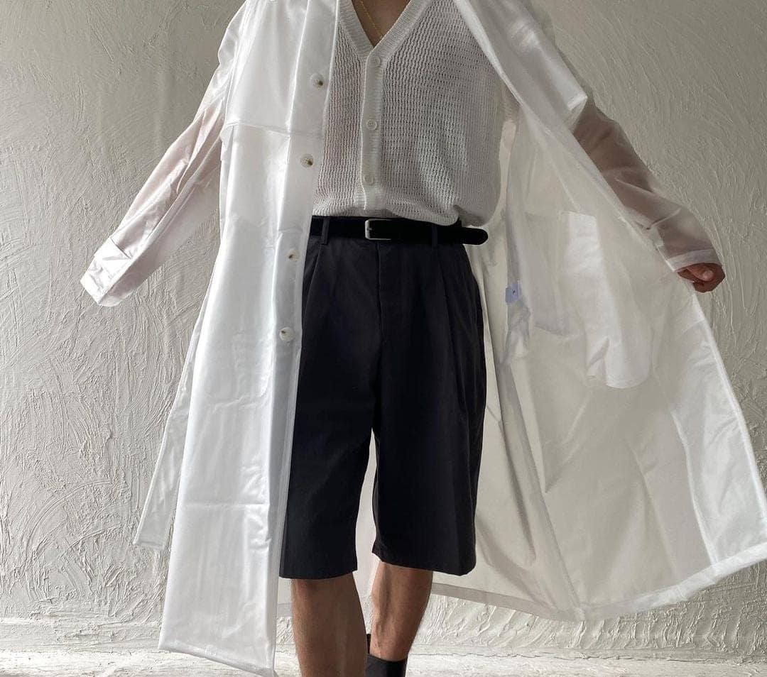 28 – Transparent Raincoat with Shorts & White Knitted Sweater