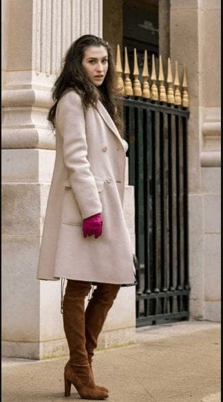 ↓ 17. Trendy Thigh-High Boots and Neutral Coat