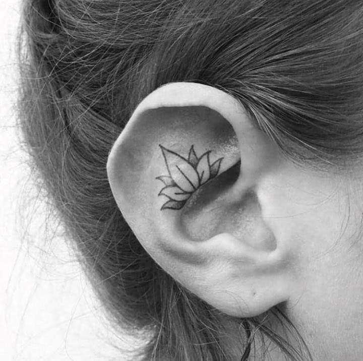 ↓ 18. Ear Tattoo