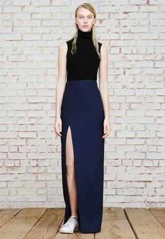 6 – Match Black Sleeveless Turtleneck Tops With Blue Long Split Skirt