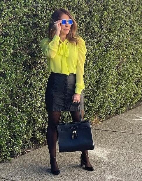 ↓ 41 – Pair a Neon Blouse with a Black Skirt