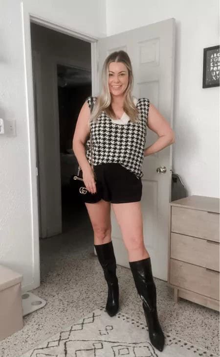 17 – Mini Shorts With Sleeveless Check Sweater And Long Boots