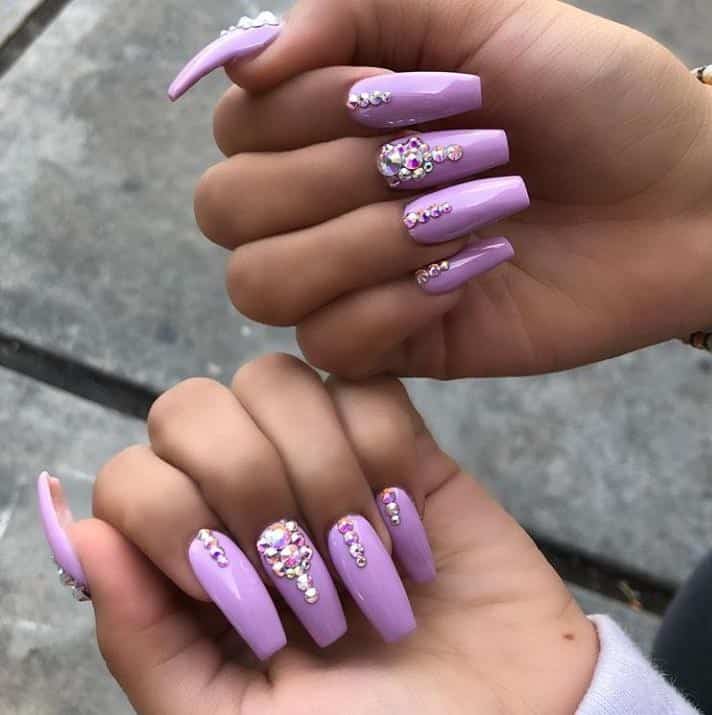 ↓ 61. Light Purple Nails With Crystals