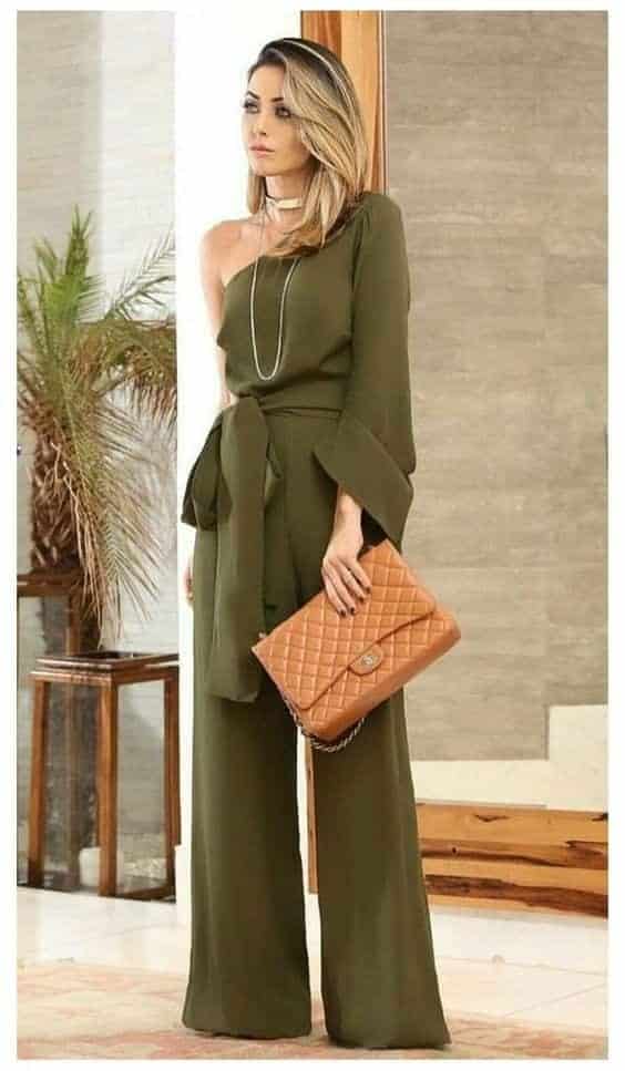 ↓ 6 – Green Jumpsuit and Tan Handbag