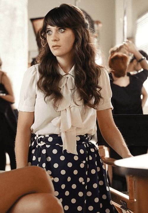 ↓ 7. That ruffled blouse and polka-dot skirt