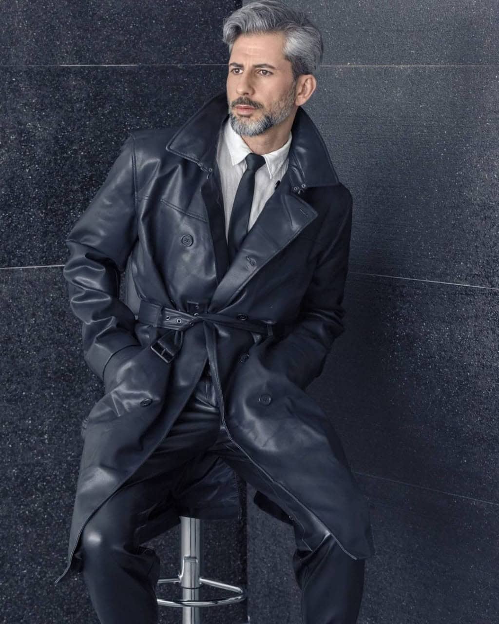 40 – Black Rain Coat Over A Black Suit