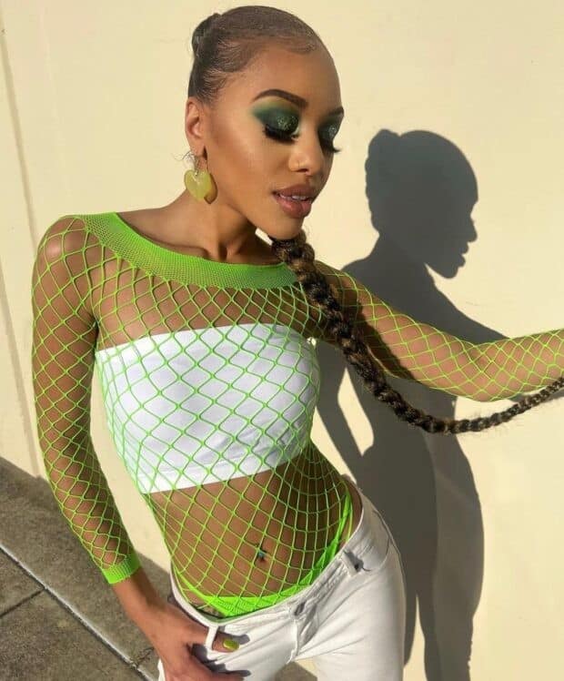 12 – Neon Green Fishnet Top Over a White Tube Top