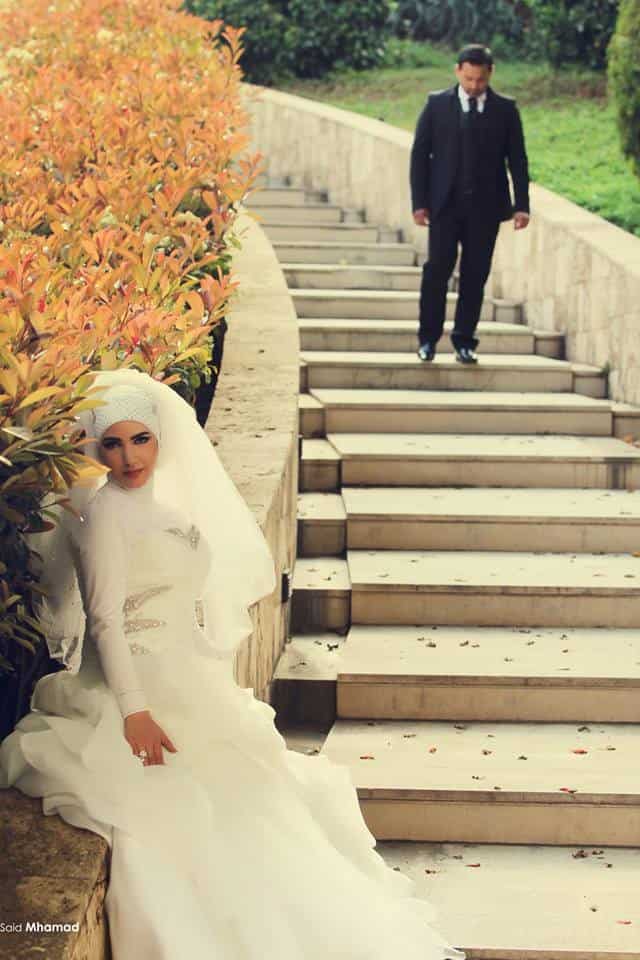 ↓ 71 –  Posing On Stairs On Wedding Day