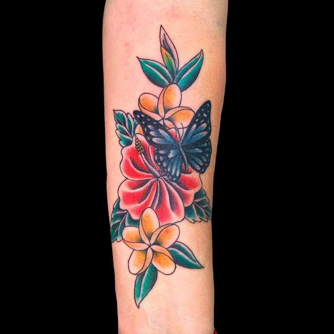 ↓ 18 – Colorful Frangipani Tattoos