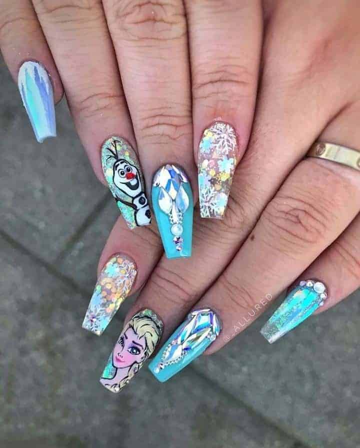 ↓ 35. Frozen Inspired Nails