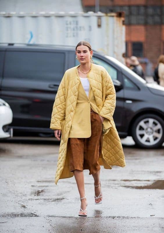 21 – Go for the Double Coat Look in Pastel Yellow