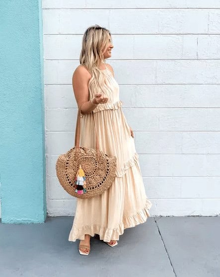 09 – Frilled Cream-Colored Maxi Dress And Pair It With Cane Bag