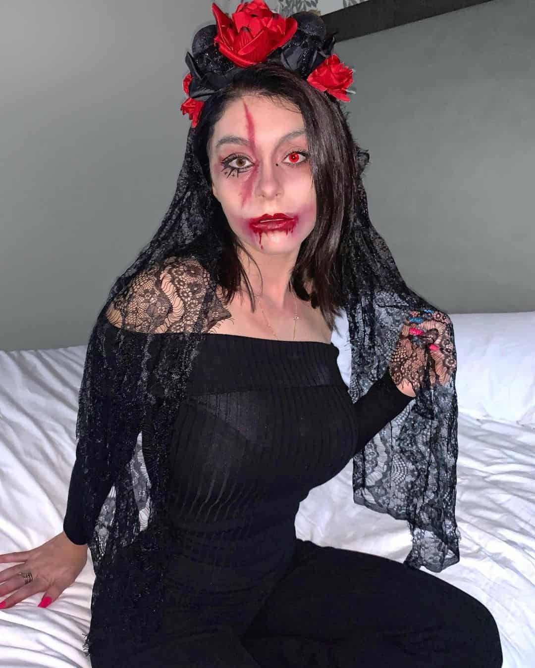 2 – Creepy Dracula Look With Tight Fitted Black Outfit and Lacey Cover Up