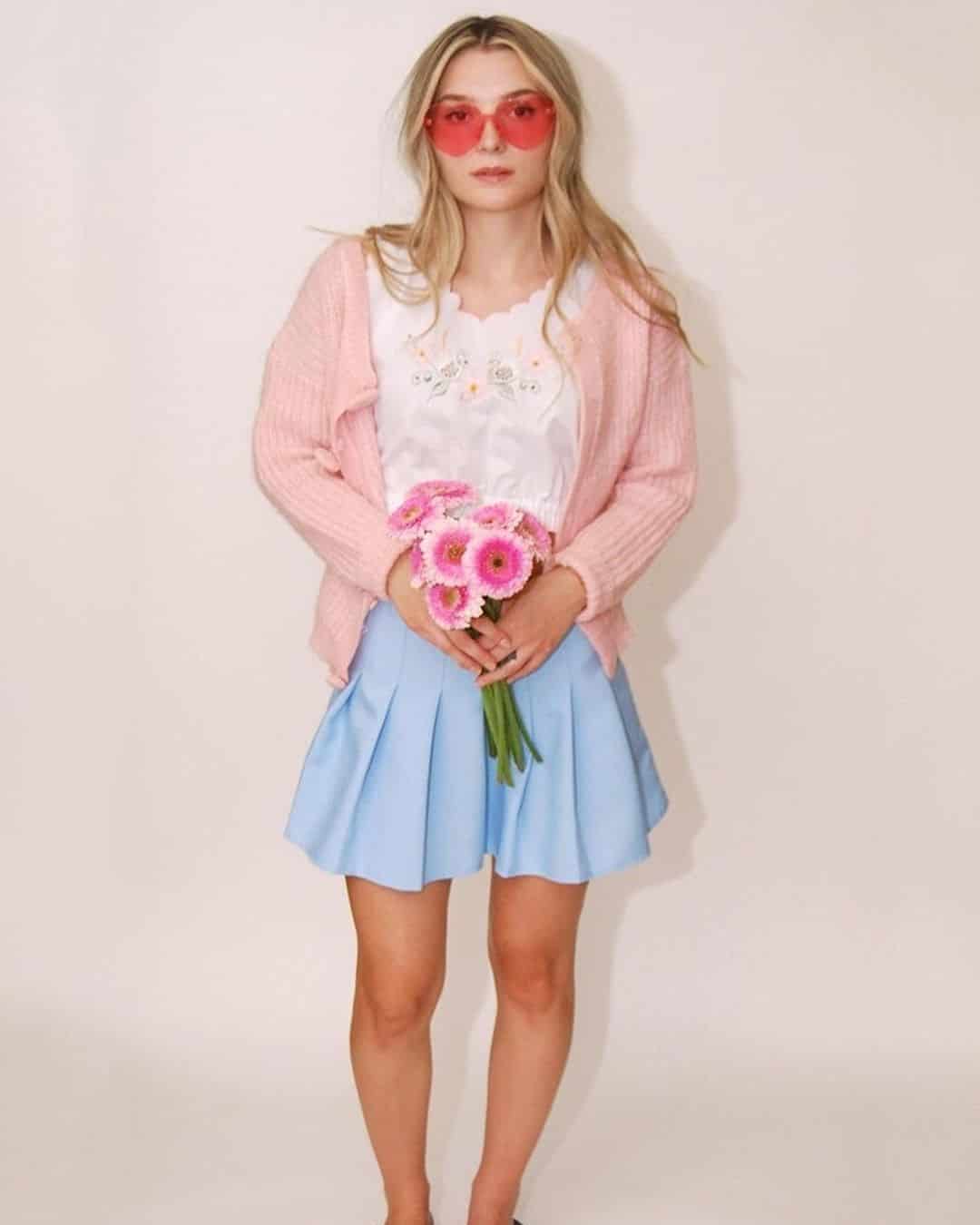 7 – Light Blue Pleated Skirt with Pink Sweater