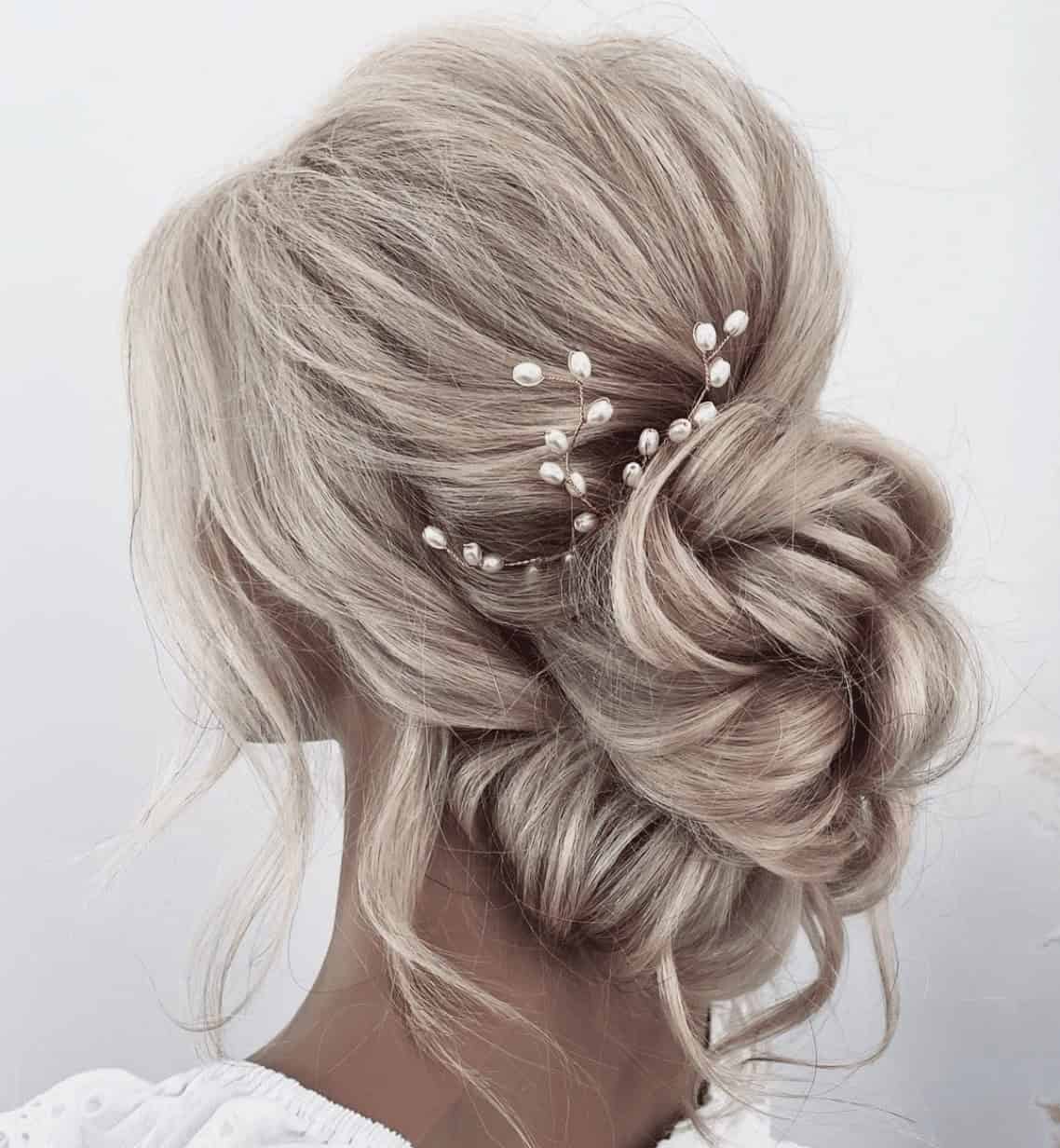 3 – Low Textured Bun with Pearl Accessories