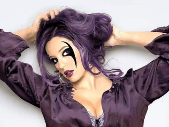 ↓ 11. Exotic Eye Make up with Purple Hair