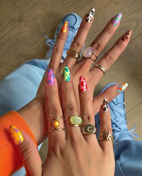 17 – Multicolored Cow Print Nails