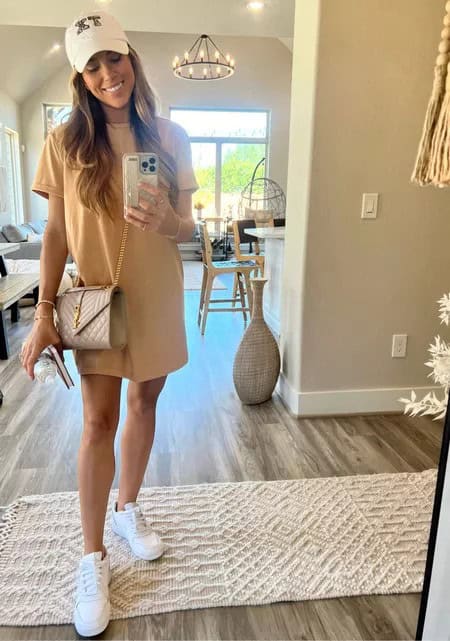 14 – Cream Shirt Dress With a White Cap