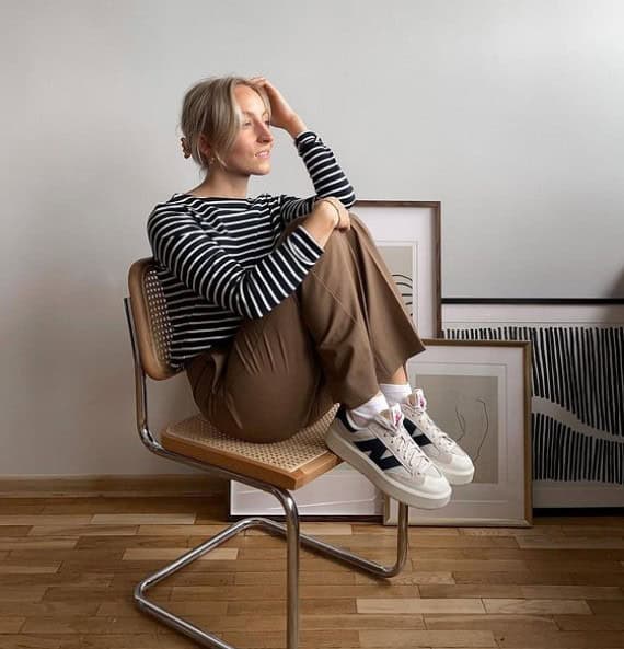 13 – Striped Black and White Top With Brown Pants