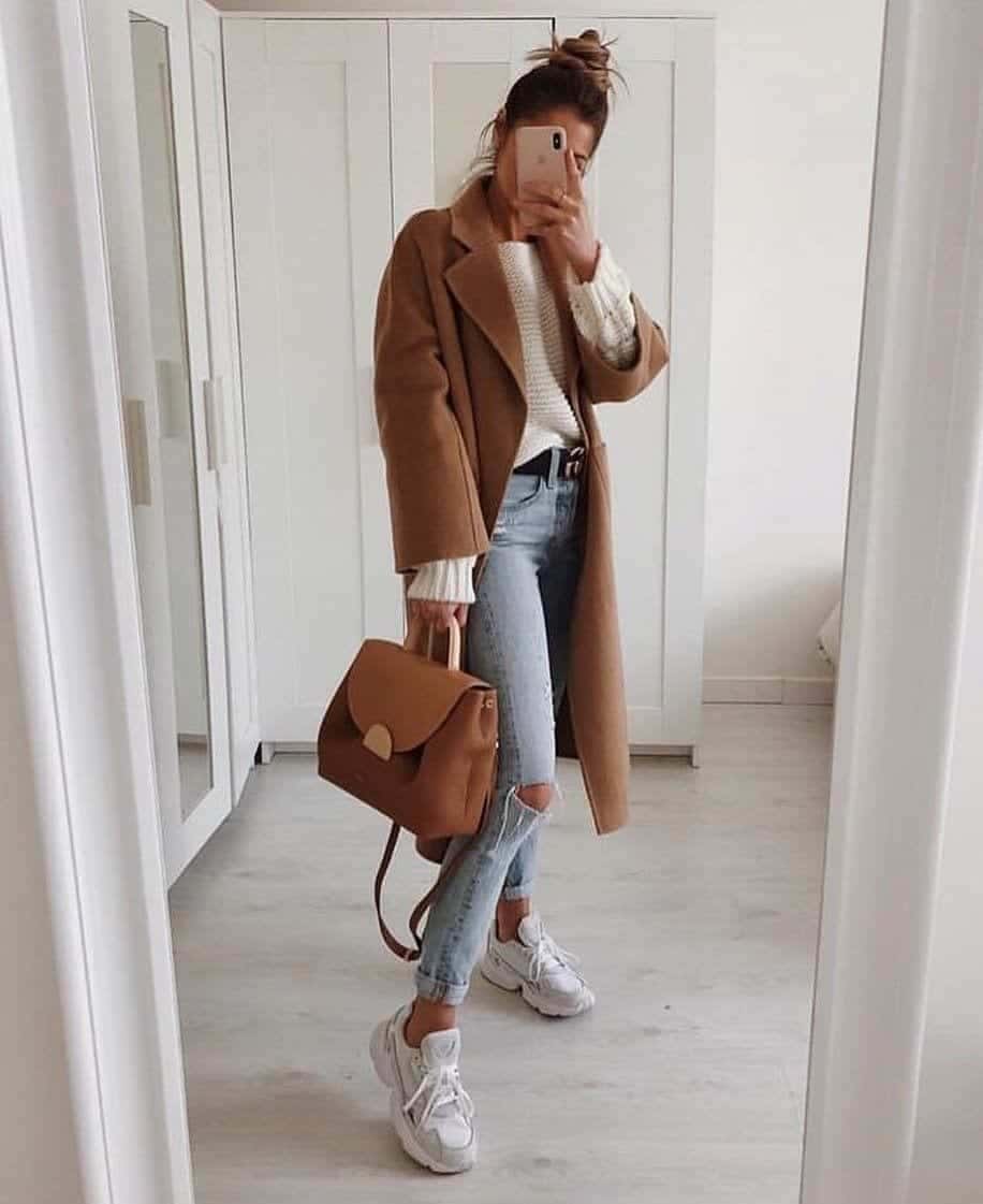 ↓ 7 – Long Coat with Ripped Jeans