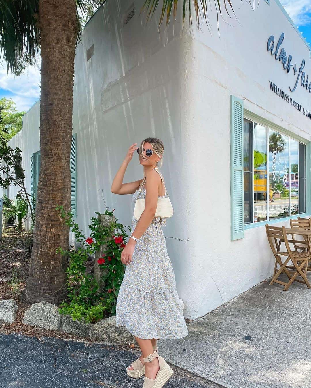 19 – Summer Floral Dress With Minimalistic Floral Print Paired With Platform Heels and Cream Baguette Bag