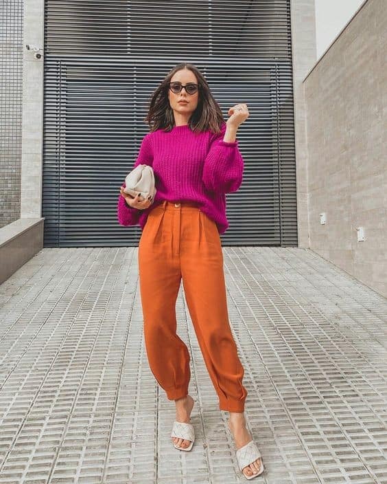 13 – Orange pants with a pink sweater