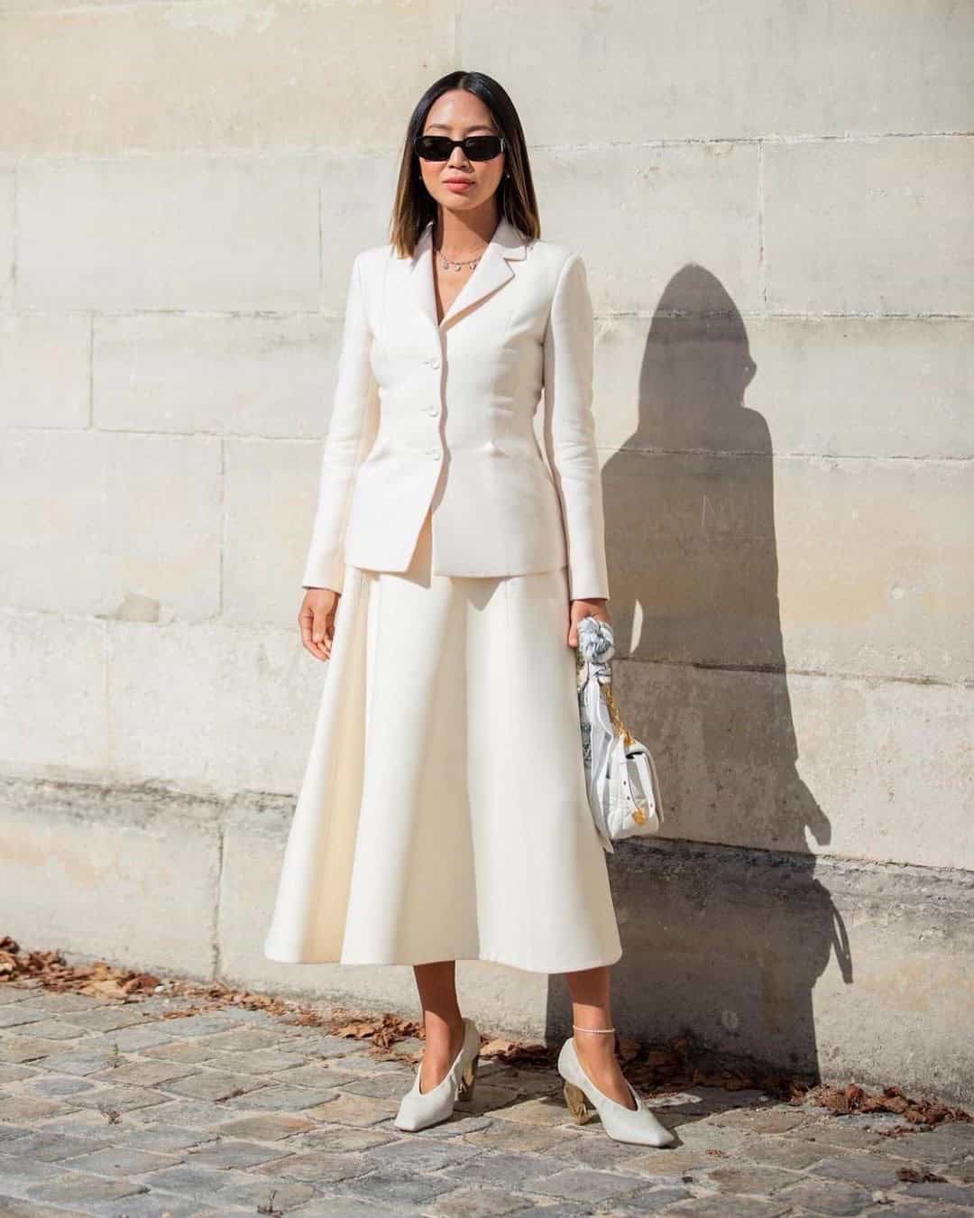 14 – A midi-length skirt with matching blazer