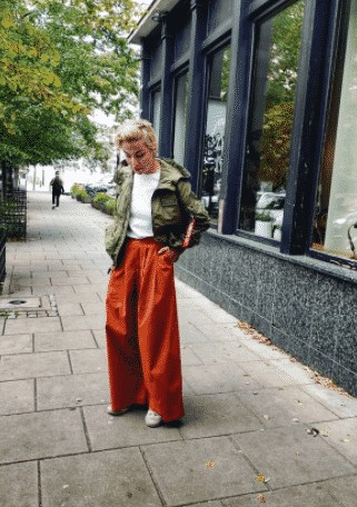 9 – Wide Legged Pants with a Green Bomber Jacket