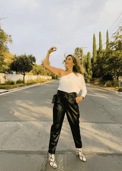 15 – Styling a White One Shoulder Top With Leather Pants