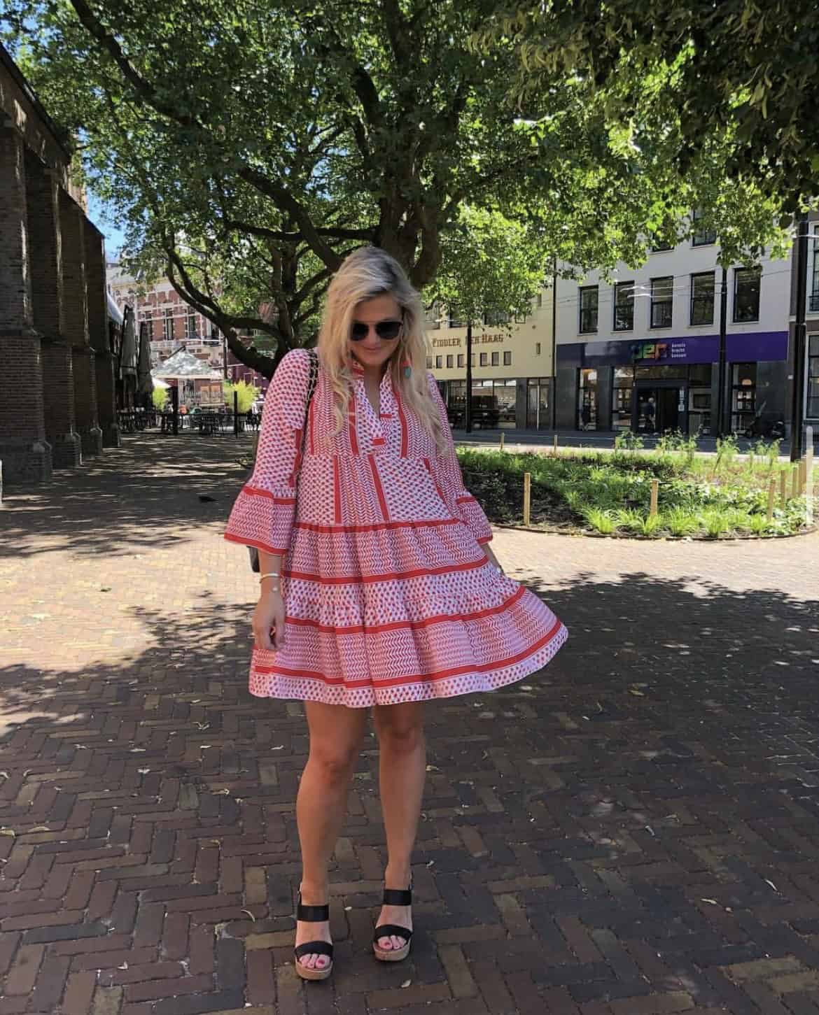 5 – Red And White Peplum Style Dress With Printed Geometric Patterns