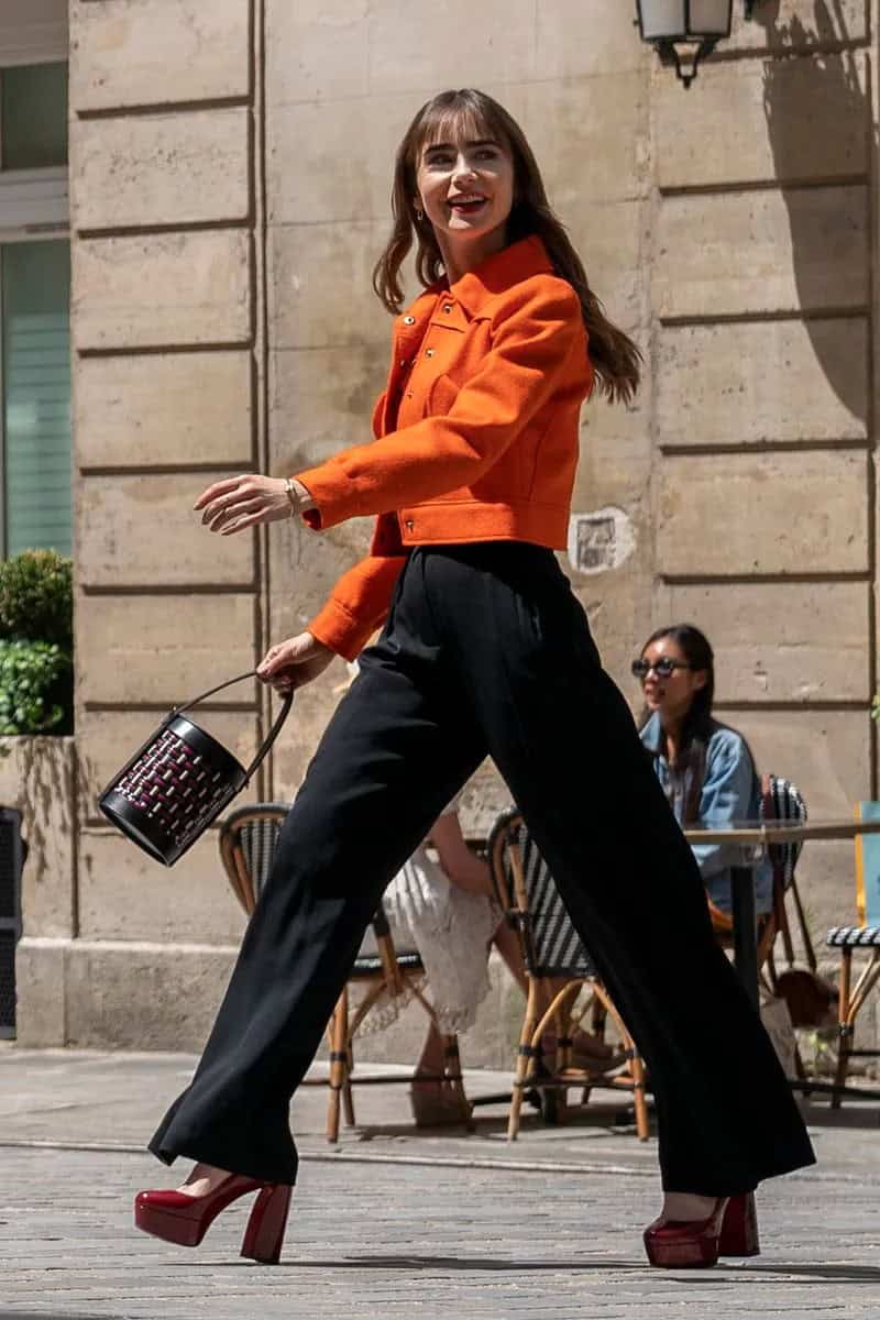 9 – Bright Orange Jacket Paired with Black Wool Pants