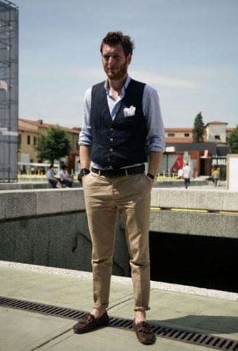 ↓ 05- Blue waistcoat over a blue shirt with Brown Jeans and Trainers